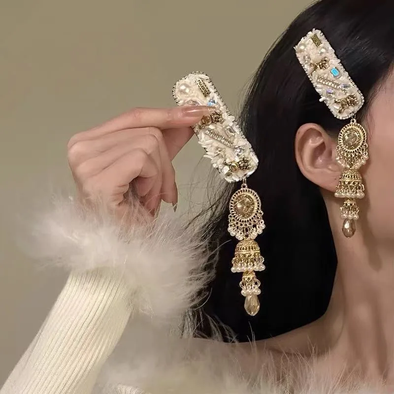 Sweet, fresh, noble, niche, high-end design, gold tassel square hair clip, bangs side clip, broken hair clip for women
Sweet, fresh, noble, niche, high-end design, gold tassel square hair clip, bangs side clip, broken hair clip for women