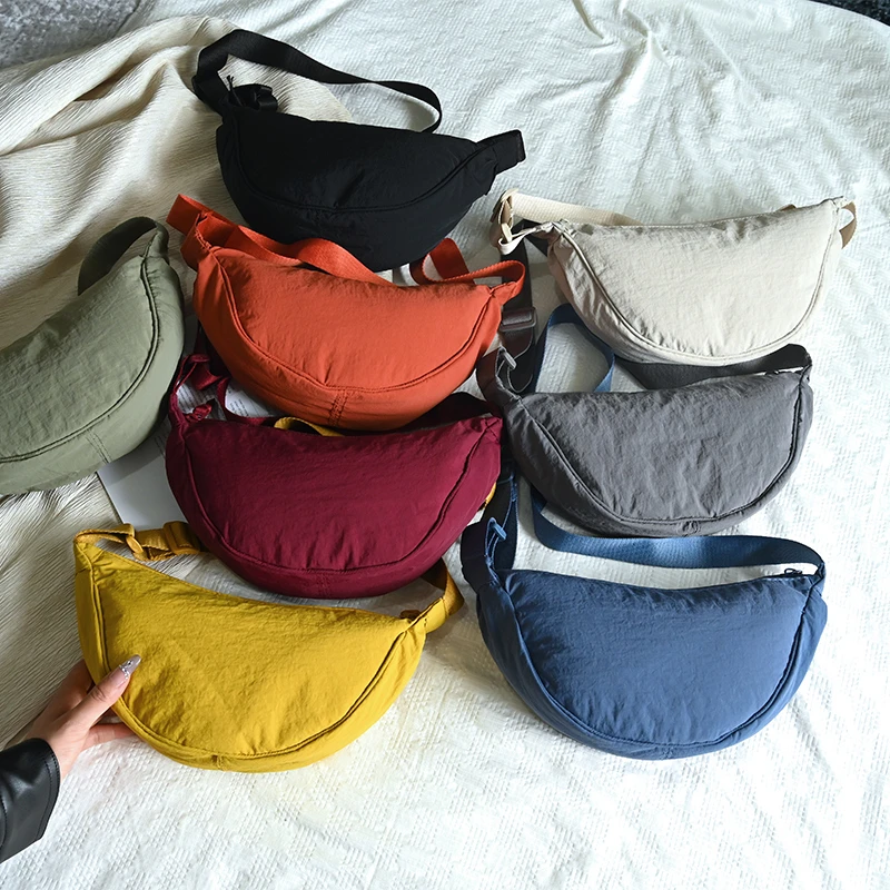 New Simple and Casual Solid Color Nylon Large Capacity Women's Dumpling Bag Shoulder Bag for Travel and Commuting
New Simple and Casual Solid Color Nylon Large Capacity Women's Dumpling Bag Shoulder Bag for Travel and Commuting