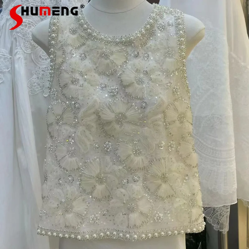 Women's 2026 Summer New High-end Round Neck Sleeveless Tops Feminine Fashion Beaded Flower Vests Ladies High Street Tank Tops
Women's 2026 Summer New High-end Round Neck Sleeveless Tops Feminine Fashion Beaded Flower Vests Ladies High Street Tank Tops