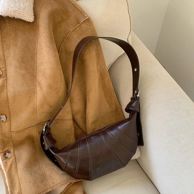 Retro Coffee Horn Bag Women's Underarm Bag Autumn and Winter 2025 New Fashionable Korean Versatile Messenger Bag Dumpling Bag
Retro Coffee Horn Bag Women's Underarm Bag Autumn and Winter 2025 New Fashionable Korean Versatile Messenger Bag Dumpling Bag