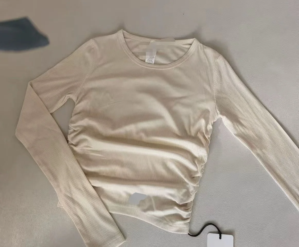 Новая женская спортивная футболка с длинным рукавом и круглым вырезом, с плиссировкой по бокам, для йоги и фитнеса, осенне-зимняя коллекция, а также повседневные брюки.
Новая женская спортивная футболка с длинным рукавом и круглым вырезом, с плиссировкой по бокам, для йоги и фитнеса, осенне-зимняя коллекция, а также повседневные брюки.