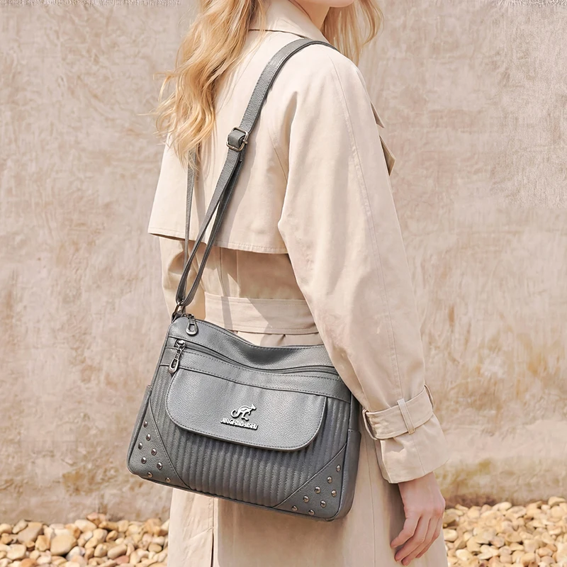 Fashion Soft Solid Color PU Shoulder Bags Hot Sale Casual Sewing Thread Square Bag Rivets Multi-pocket Women's Crossbody Bags
Fashion Soft Solid Color PU Shoulder Bags Hot Sale Casual Sewing Thread Square Bag Rivets Multi-pocket Women's Crossbody Bags