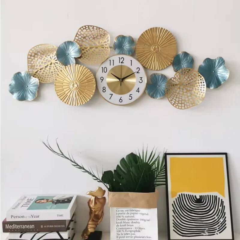 Новинка 2021 года: Сине-золотые настенные часы в скандинавском стиле с металлическим декором в форме листьев лотоса для украшения дома
Новинка 2021 года: Сине-золотые настенные часы в скандинавском стиле с металлическим декором в форме листьев лотоса для украшения дома