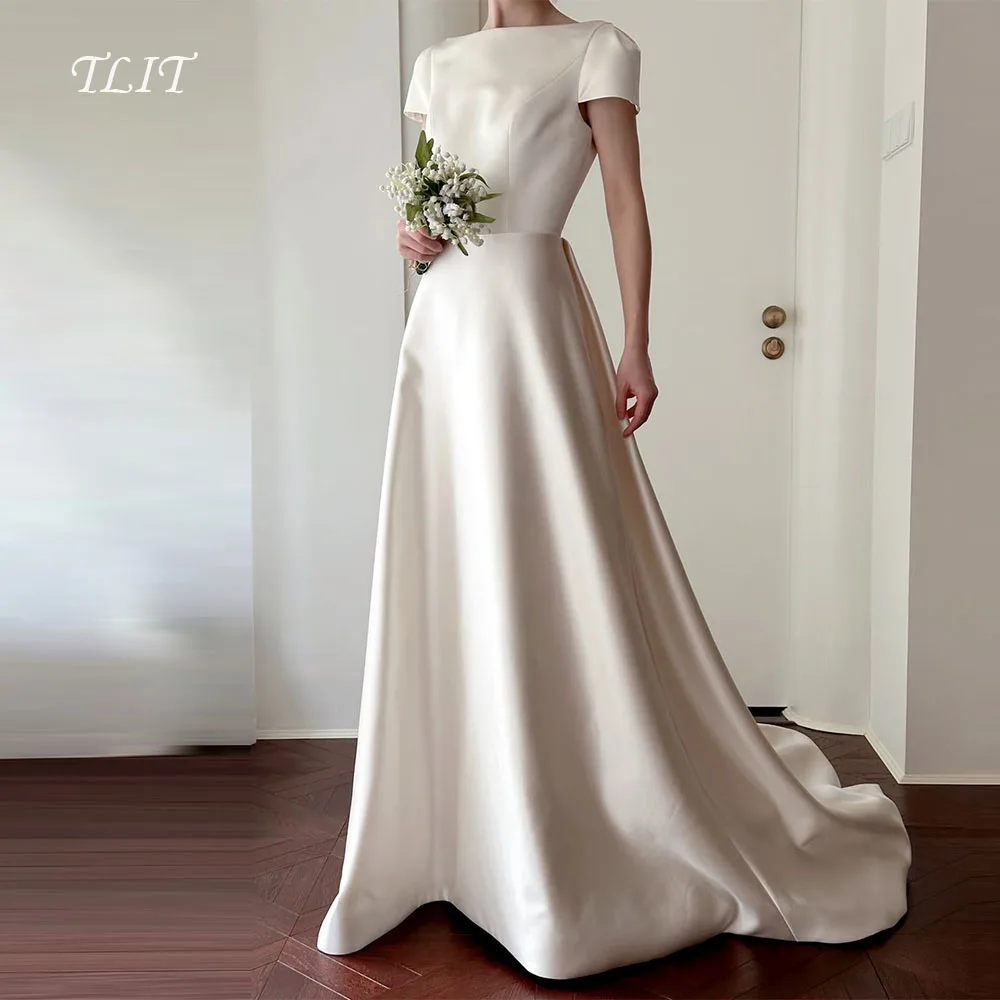 TLIT Elegant Ivory Silk Satin A-Line Wedding Dress O-Neck Short Sleeves Prom Gowns Korea Bridal Dress Photos Shoot Customized
TLIT Elegant Ivory Silk Satin A-Line Wedding Dress O-Neck Short Sleeves Prom Gowns Korea Bridal Dress Photos Shoot Customized