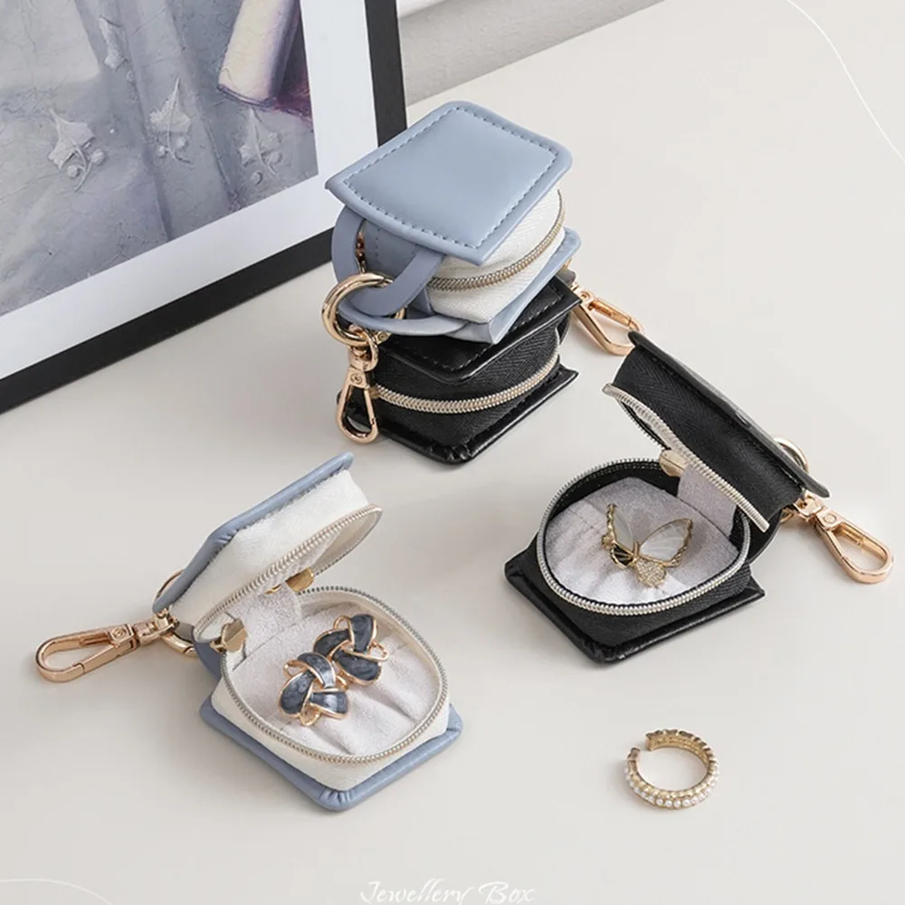 Luxury Cute Mini PU Jewelry Box Portable With Keychain Bracelet Storage Boxes Fashion Simple Ring Case Gift Box
Luxury Cute Mini PU Jewelry Box Portable With Keychain Bracelet Storage Boxes Fashion Simple Ring Case Gift Box