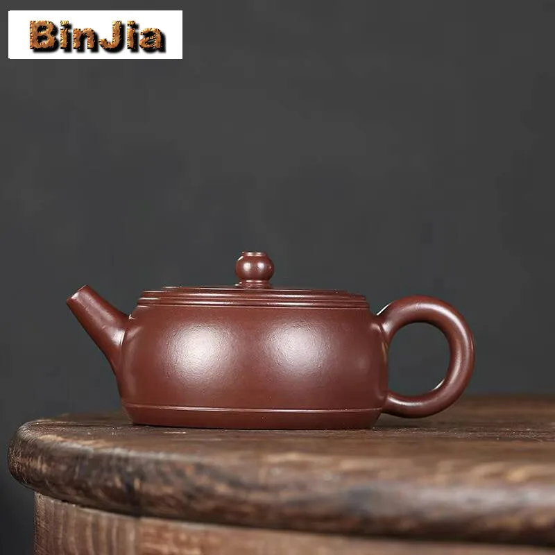 200 мл Исин фиолетовые глиняные чайники ручной работы с колокольчиками, горшок с необработанной рудой, Чжу, грязевой чайник с заварочным устройством, чайный набор Zisha, подарок
200 мл Исин фиолетовые глиняные чайники ручной работы с колокольчиками, горшок с необработанной рудой, Чжу, грязевой чайник с заварочным устройством, чайный набор Zisha, подарок