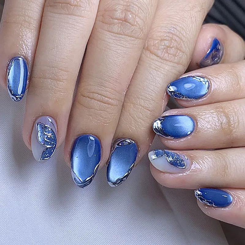 30Pcs Blue Cat Eye Press On Nails Short Oval Fake Nails with Silver Foil & Glitter Flower Design False Nails for Women&Girl
30Pcs Blue Cat Eye Press On Nails Short Oval Fake Nails with Silver Foil & Glitter Flower Design False Nails for Women&Girl
