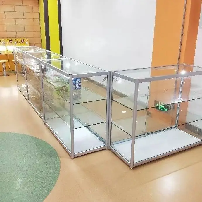 3 layers smoke cabinet display showcase counter pharmacy interior design with light glass display cabinet for smoke shop
3 layers smoke cabinet display showcase counter pharmacy interior design with light glass display cabinet for smoke shop