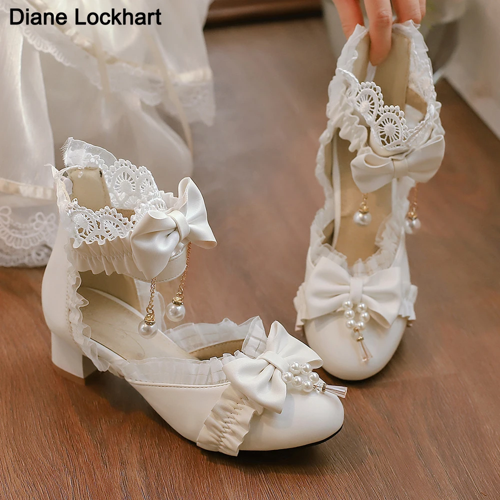Classic Bow Lolita Shoes Sweet Lace back zipper Ankle Strap Spike Heel Pumps Female Cosplay Party Ruffles Princess High Heels
Classic Bow Lolita Shoes Sweet Lace back zipper Ankle Strap Spike Heel Pumps Female Cosplay Party Ruffles Princess High Heels