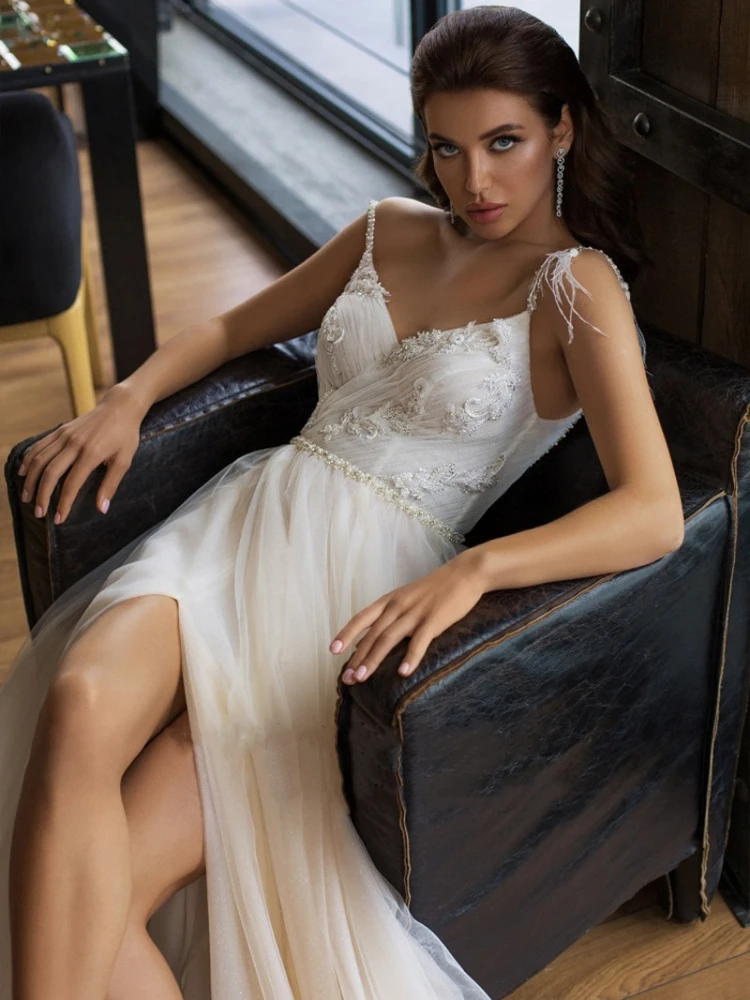 Sexy Tulle V Neck Wedding Dresses With Slit Bridal Dresses A-Line Sleeveless Backless robe de mariée Mariage Customized
Sexy Tulle V Neck Wedding Dresses With Slit Bridal Dresses A-Line Sleeveless Backless robe de mariée Mariage Customized