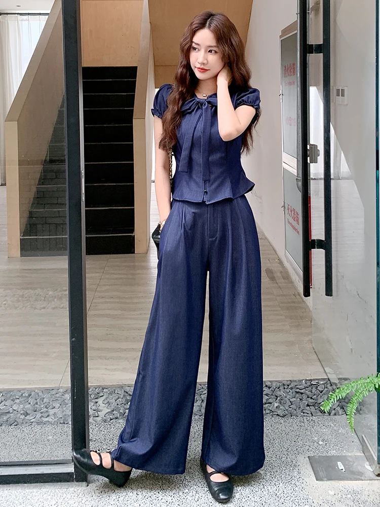 Женская одежда Модная элегантная уличная одежда из двух предметов Сладкие джинсовые топы Рубашка Бандажная блузка с бантом Длинные брюки Брюки Комплект Femme
Женская одежда Модная элегантная уличная одежда из двух предметов Сладкие джинсовые топы Рубашка Бандажная блузка с бантом Длинные брюки Брюки Комплект Femme