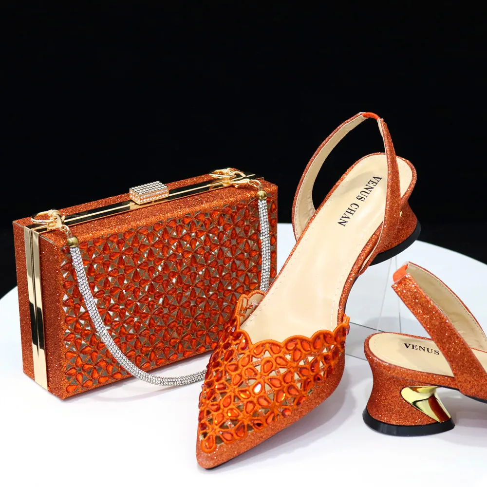 Fashionable Simplicity Style New Design Women Matching Shoes and Bag Set in Orange Color Pointed Toe Pumps for Christmas Party
Fashionable Simplicity Style New Design Women Matching Shoes and Bag Set in Orange Color Pointed Toe Pumps for Christmas Party