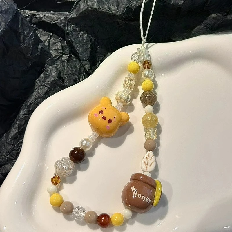 Disney Pooh Bear birthday gift, mobile phone case hanging chain ornament, portable and anti-lost mobile phone chain
Disney Pooh Bear birthday gift, mobile phone case hanging chain ornament, portable and anti-lost mobile phone chain