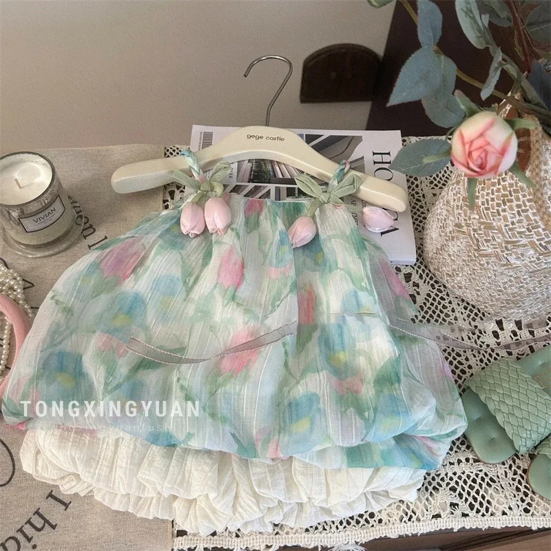 Children's Clothing New Summer Girls' Floral Strap Top Children's Western Style Bud-Waisted Shorts Two-Piece Set
Children's Clothing New Summer Girls' Floral Strap Top Children's Western Style Bud-Waisted Shorts Two-Piece Set