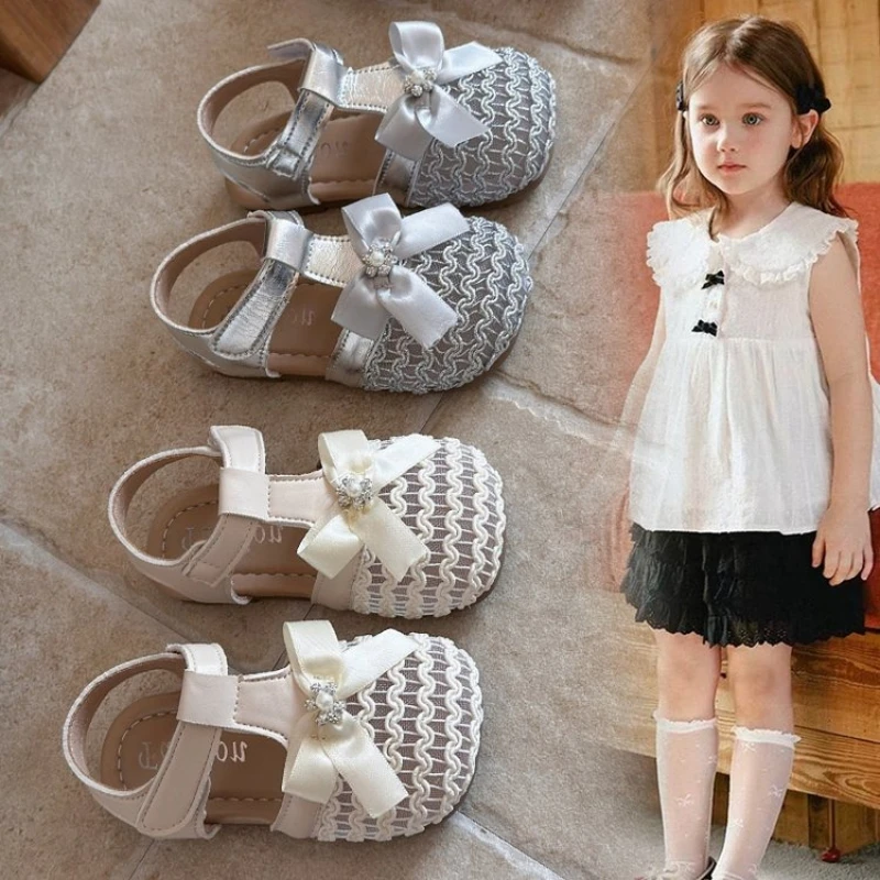 2026 New Children's Summer Sandals Sweet Bowknot Princess Causal Girls Ballet Sandals Hollow-out School Kids Dress Flat Shoes
2026 New Children's Summer Sandals Sweet Bowknot Princess Causal Girls Ballet Sandals Hollow-out School Kids Dress Flat Shoes