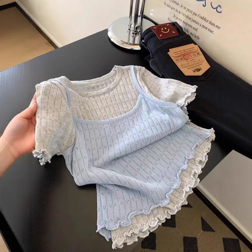 Contrasting Color Fake Two-piece Suspender Knitted Sweater Short Sleeves 2026 Spring and Summer New Fungus Edge Retro Gentle Top
Contrasting Color Fake Two-piece Suspender Knitted Sweater Short Sleeves 2026 Spring and Summer New Fungus Edge Retro Gentle Top