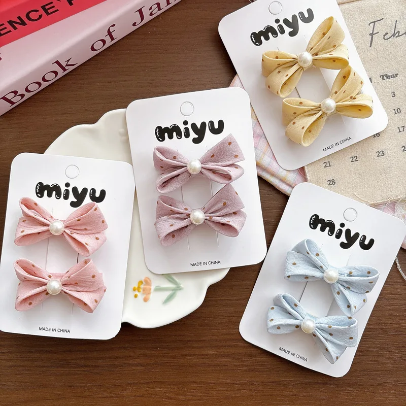 Милые разноцветные заколки-бантики из ткани в горошек с жемчугом для девочек, детские заколки-зажимы для волос, аксессуары для прически
Милые разноцветные заколки-бантики из ткани в горошек с жемчугом для девочек, детские заколки-зажимы для волос, аксессуары для прически