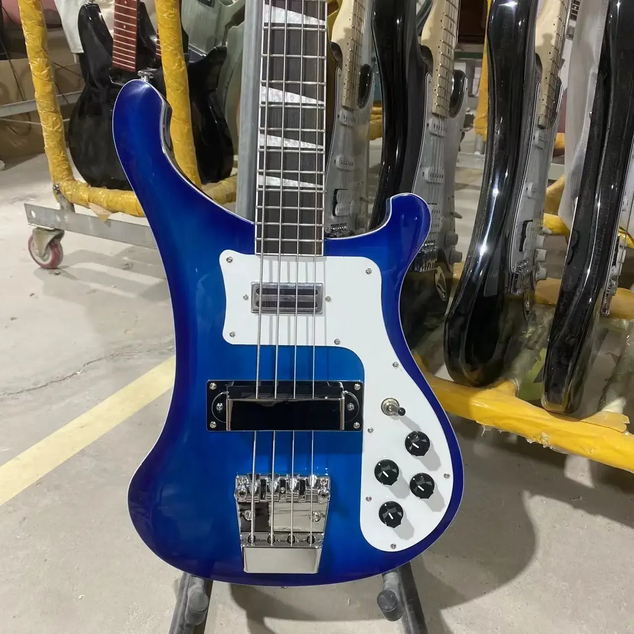 NEW-4003 Backer Electric Guitar Bass Guitar Transparent Blue Color Basswood Body Rosewood Fretboard 4Strings
NEW-4003 Backer Electric Guitar Bass Guitar Transparent Blue Color Basswood Body Rosewood Fretboard 4Strings