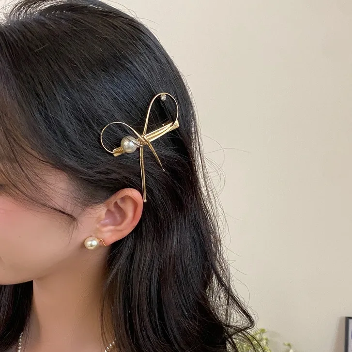Premium Hollow Metal Bow Hair Clip with Pearl Korean Style Side Clip Non Slip Strong Grip Lightweight Braiding Hair
Premium Hollow Metal Bow Hair Clip with Pearl Korean Style Side Clip Non Slip Strong Grip Lightweight Braiding Hair