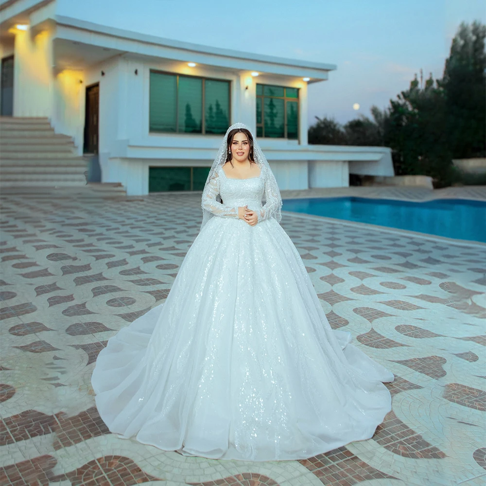 Exquisit Wedding Dresses Square Collar Long Sleeve Plus Size Bride Dress with Sequined A-Line Sweep Train Bridal Gown Customized 
Exquisit Wedding Dresses Square Collar Long Sleeve Plus Size Bride Dress with Sequined A-Line Sweep Train Bridal Gown Customized