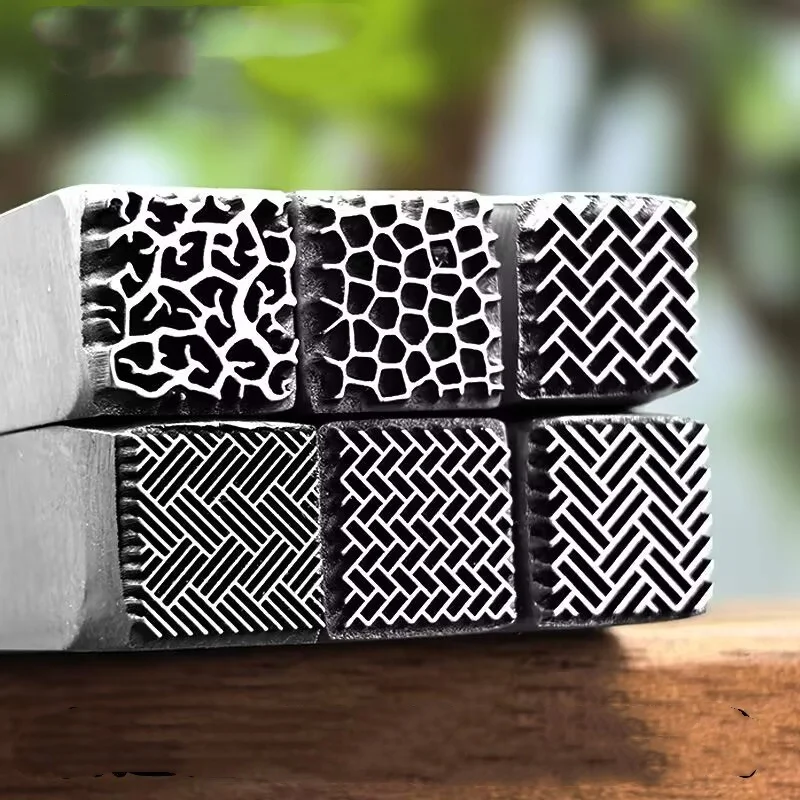 Jewellery stamps, textured steel stamps, gold and silver chasing dies, bracelet texturing tools, and gold-beating tools
Jewellery stamps, textured steel stamps, gold and silver chasing dies, bracelet texturing tools, and gold-beating tools