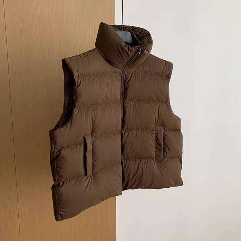 Осень-зима, однотонный жилет на пуху с воротником-стойкой, женский теплый жилет на белом утином пуху, женский стеганый жилет на молнии с завязками 
Осень-зима, однотонный жилет на пуху с воротником-стойкой, женский теплый жилет на белом утином пуху, женский стеганый жилет на молнии с завязками