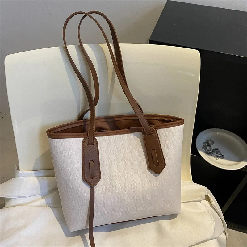 Women's simple rhombus indentation bag casual large capacity shoulder underarm bag tote bag
Women's simple rhombus indentation bag casual large capacity shoulder underarm bag tote bag