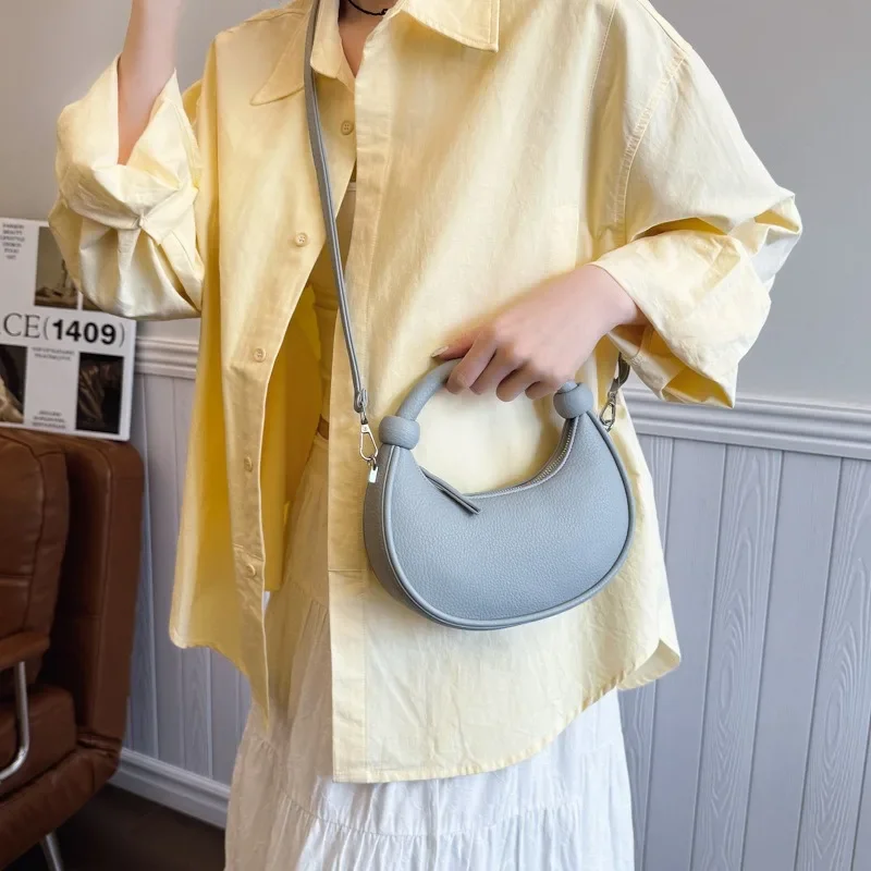 New Dumpling Bag Women Designer Crossbody Purse Minimalist Crescent Moon Bag Unique Beaded Handbag Fashionable Small Shoulder
New Dumpling Bag Women Designer Crossbody Purse Minimalist Crescent Moon Bag Unique Beaded Handbag Fashionable Small Shoulder