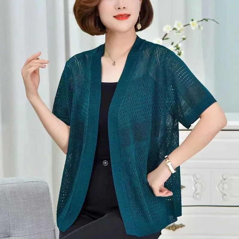 2024 Knitted Summer New Solid Color V-Neck Hollow Out Spliced Short Sleeve Elegant Chic Casual Loose Thin Style Women's Coats
2024 Knitted Summer New Solid Color V-Neck Hollow Out Spliced Short Sleeve Elegant Chic Casual Loose Thin Style Women's Coats
