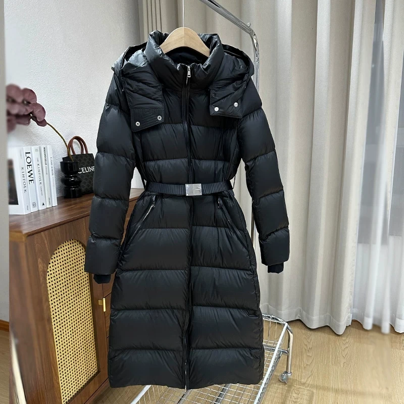 High end brand Fashion waist cinching Slim Hooded Mid long down Jacket For women Over the knee Thick Warm Coat 2026 Winter Coats
High end brand Fashion waist cinching Slim Hooded Mid long down Jacket For women Over the knee Thick Warm Coat 2026 Winter Coats