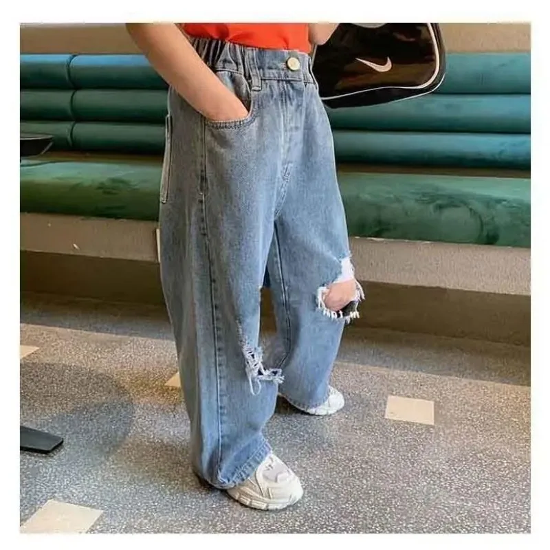 Children's pure cotton ripped jeans Spring and Autumn Korean version new boy and girl baby wide leg pants trend
Children's pure cotton ripped jeans Spring and Autumn Korean version new boy and girl baby wide leg pants trend