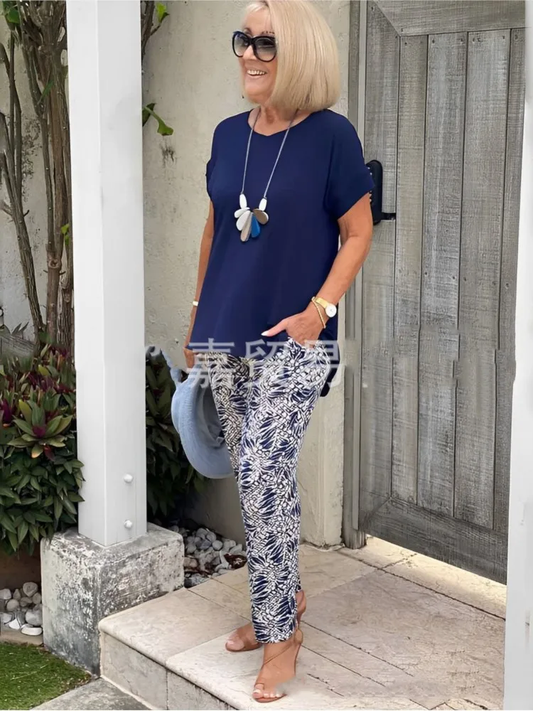 Fashion Print Women's Two Piece Set Loose Short Sleeve Solid Color Top Pants 2-Piece Set Suit 2025 Summer New Boho Women Outfit
Fashion Print Women's Two Piece Set Loose Short Sleeve Solid Color Top Pants 2-Piece Set Suit 2025 Summer New Boho Women Outfit