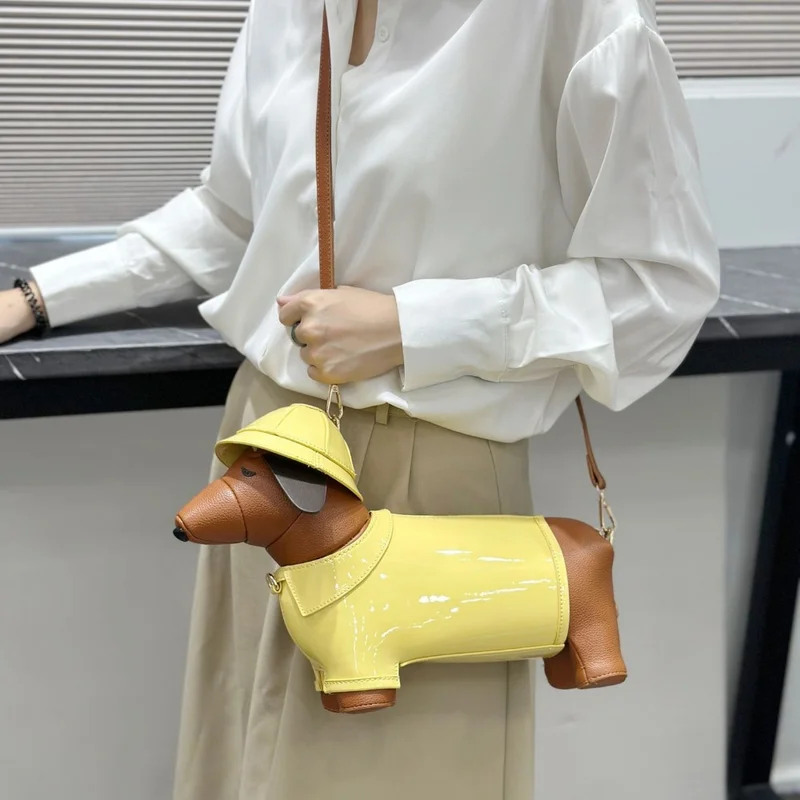 Cute Wearable Raincoat Puppy Crossbody Purse Glossy Yellow Brown Spliced PU Leather Adjustable Strap Cartoon Dog Handbag
Cute Wearable Raincoat Puppy Crossbody Purse Glossy Yellow Brown Spliced PU Leather Adjustable Strap Cartoon Dog Handbag