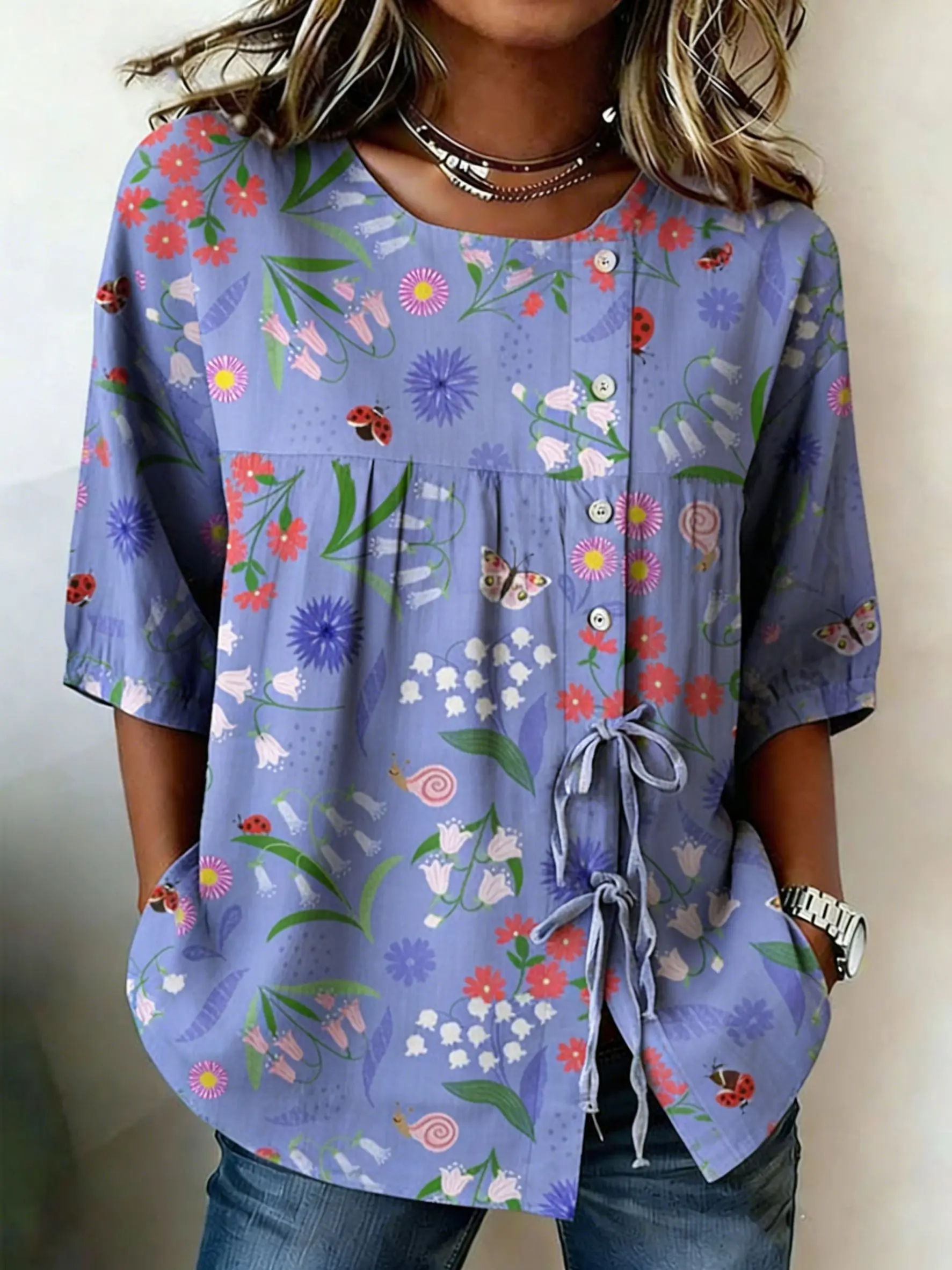 Women's Cute Floral & Insect Print Casual Blouse, Button Tie Front Loose Top with Pockets for Spring Summer Daily Wear
Women's Cute Floral & Insect Print Casual Blouse, Button Tie Front Loose Top with Pockets for Spring Summer Daily Wear