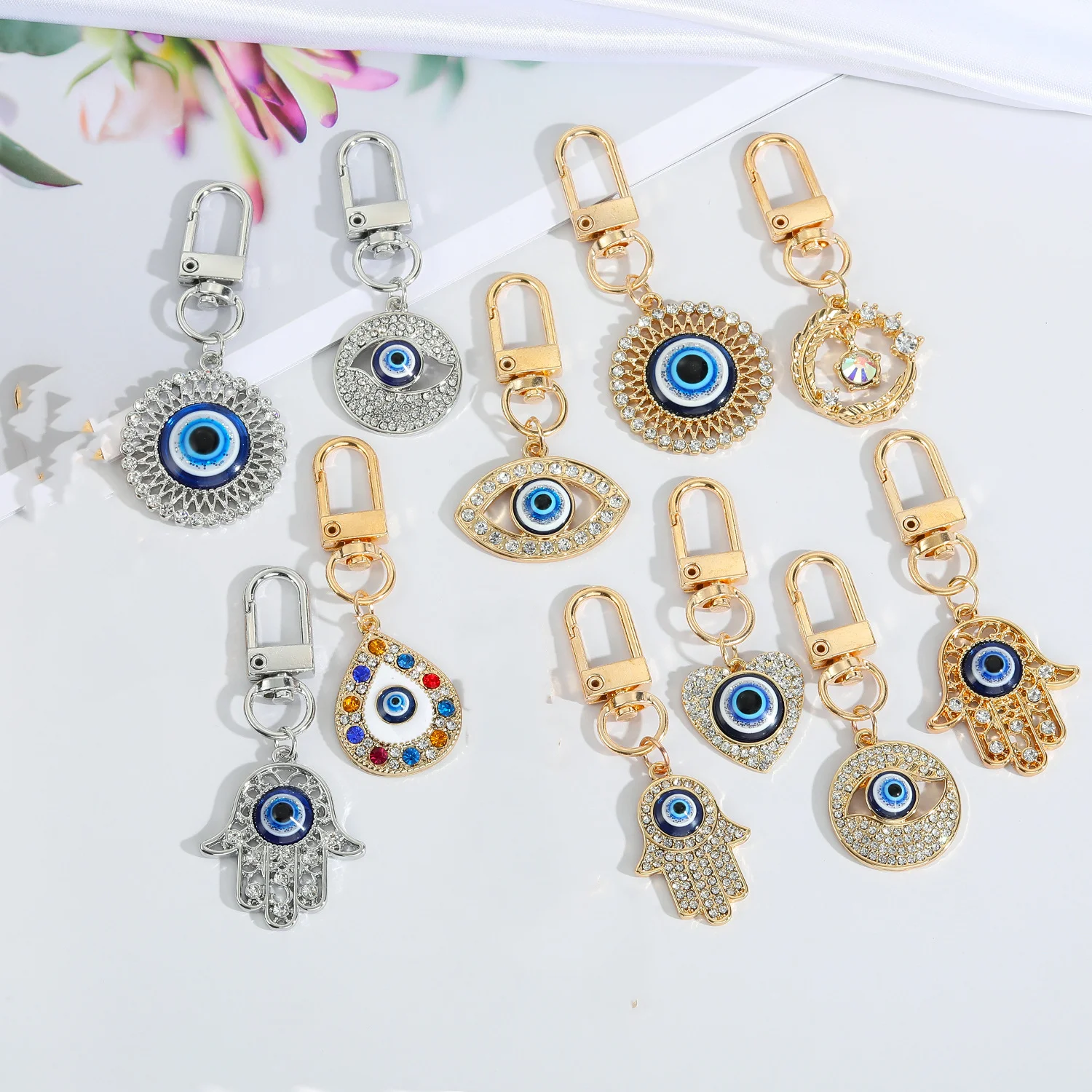 Crystal Blue Evil Eye Hasma Keychains Gold Silver Color Fatima Hand Charm Key Ring Accessories
Crystal Blue Evil Eye Hasma Keychains Gold Silver Color Fatima Hand Charm Key Ring Accessories