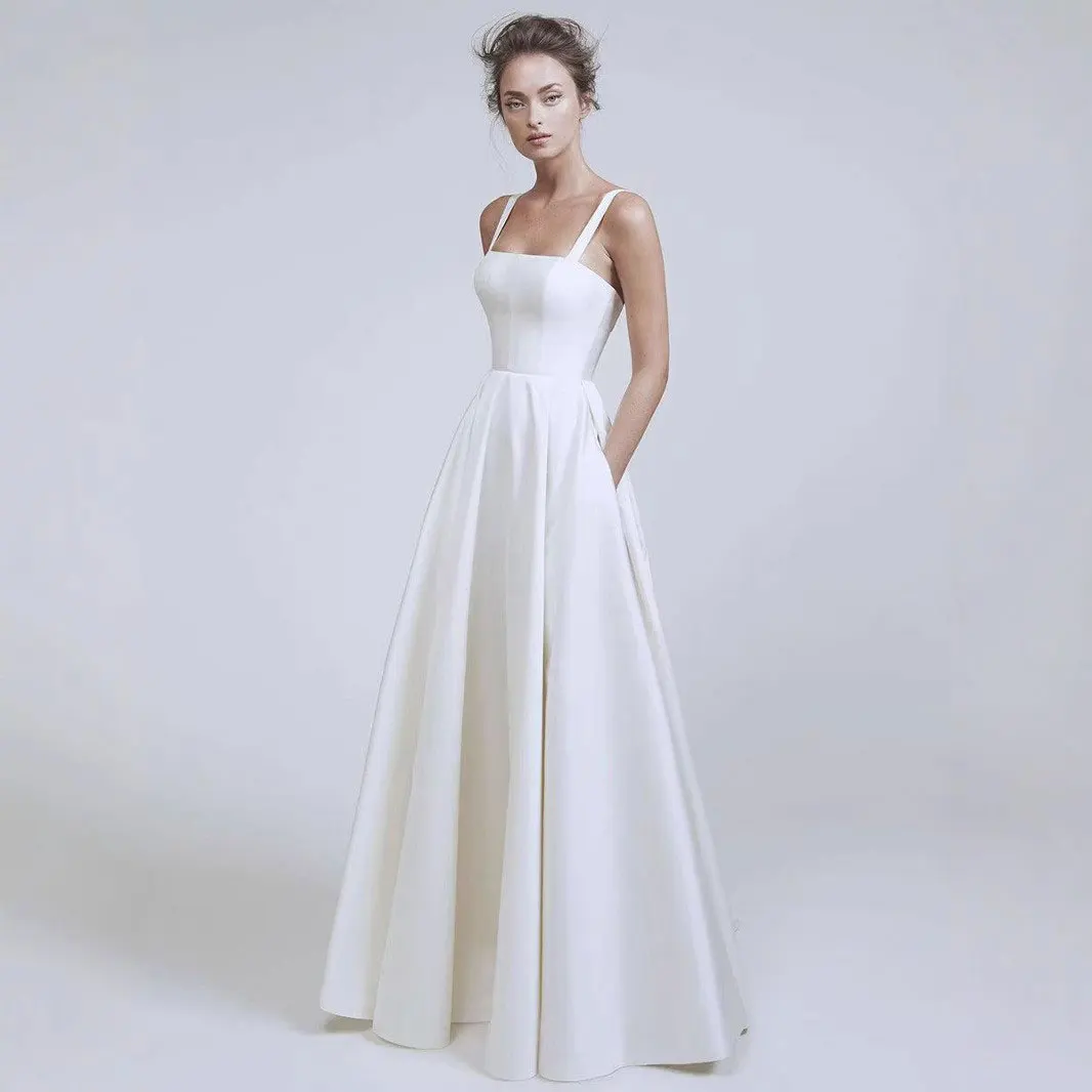 Customized Vestido Novia New Style Simple Satin Wedding Dresses Light Ivory Sexy Backless Beading Robe De Mariage Floor Length
Customized Vestido Novia New Style Simple Satin Wedding Dresses Light Ivory Sexy Backless Beading Robe De Mariage Floor Length
