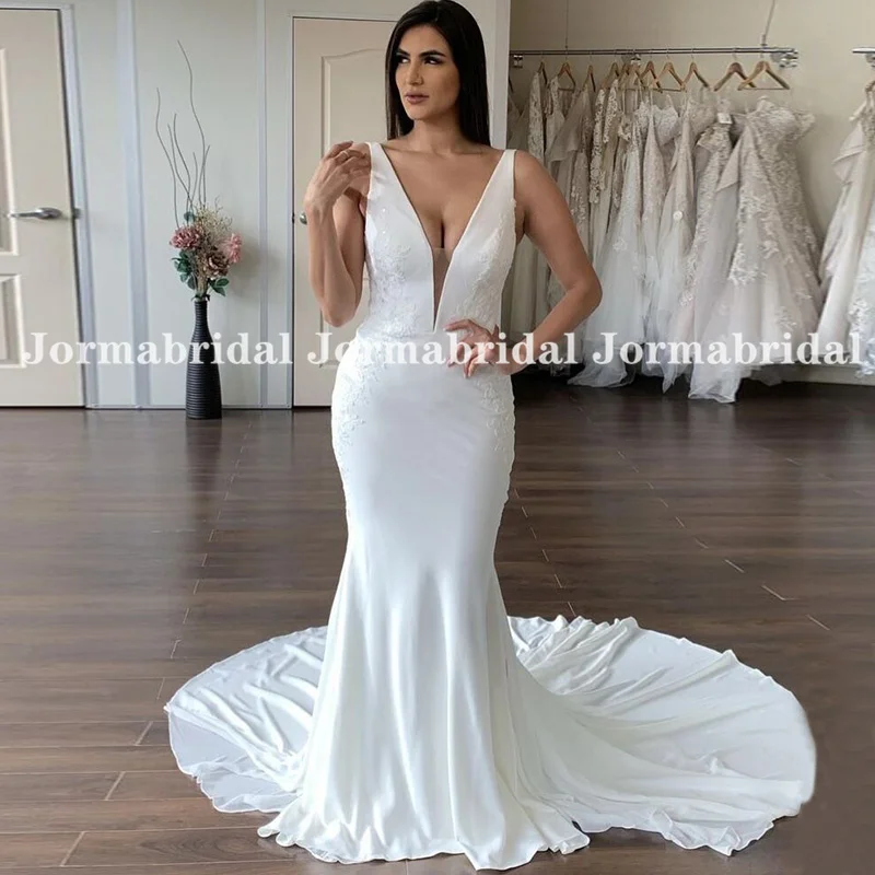 White Crepe Mermaid Wedding Dress Deep V-Neck Sleeveless Stretch Beach Bridal Dress Applique Long Train Bride Wedding Gowns 2022
White Crepe Mermaid Wedding Dress Deep V-Neck Sleeveless Stretch Beach Bridal Dress Applique Long Train Bride Wedding Gowns 2022