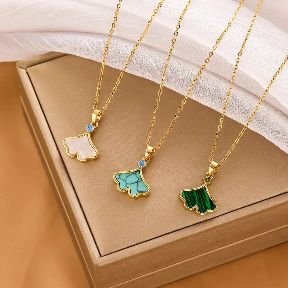 New gold skirt pendant necklace female white fritillary fan-shaped high-end necklace
New gold skirt pendant necklace female white fritillary fan-shaped high-end necklace