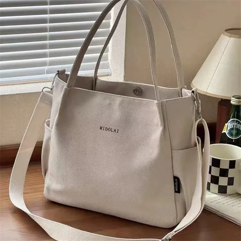 2025 Ladies Hand Bags Female Handbag Large Capacity Canvas Tote Bags for Work Commuting Carrying Bag College Style Messenger Bag
2025 Ladies Hand Bags Female Handbag Large Capacity Canvas Tote Bags for Work Commuting Carrying Bag College Style Messenger Bag