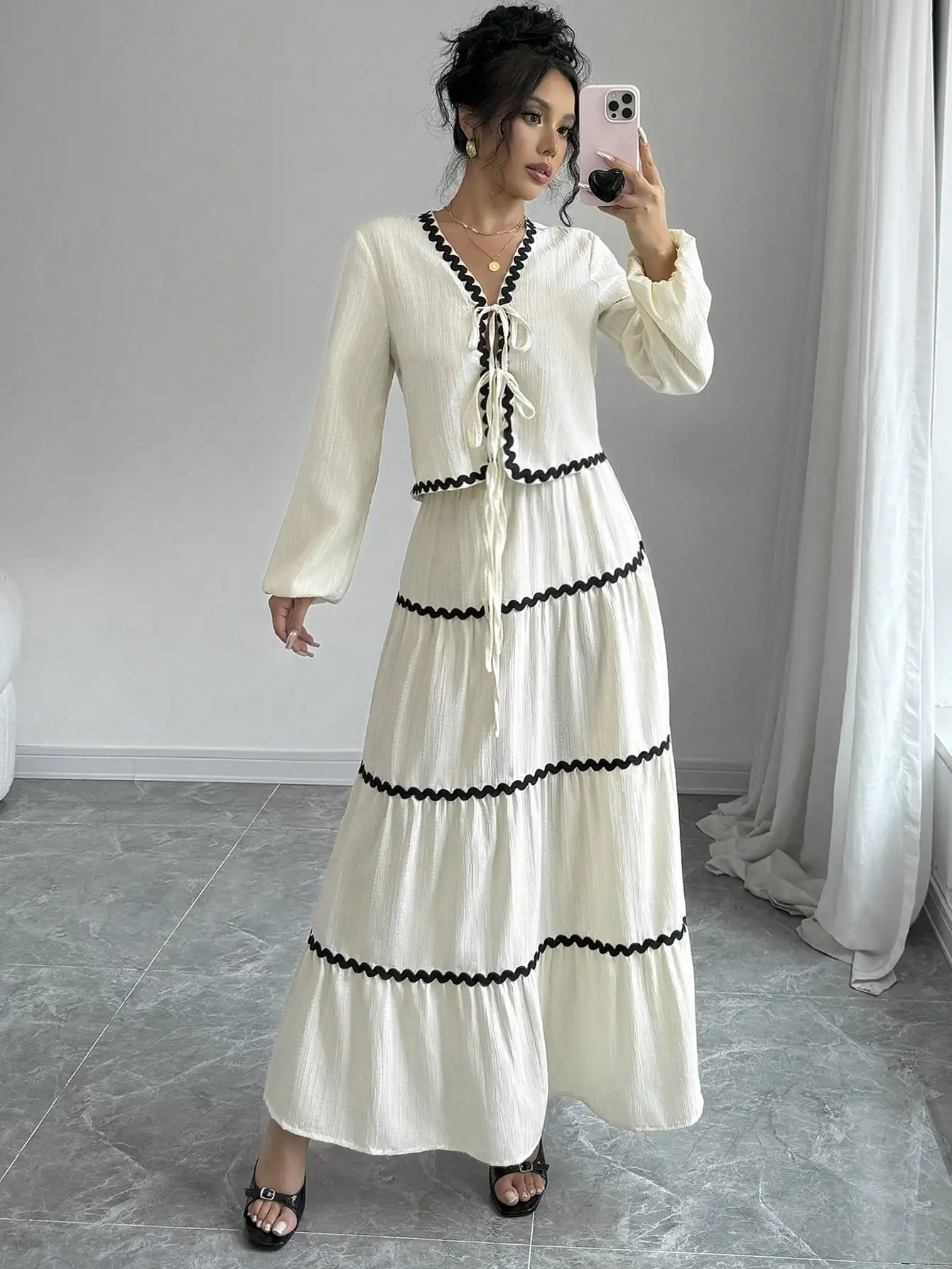 Элегантный комплект из двух предметов во французском стиле с рукавами-фонариками, многослойными оборками и бантом для женщин
Элегантный комплект из двух предметов во французском стиле с рукавами-фонариками, многослойными оборками и бантом для женщин