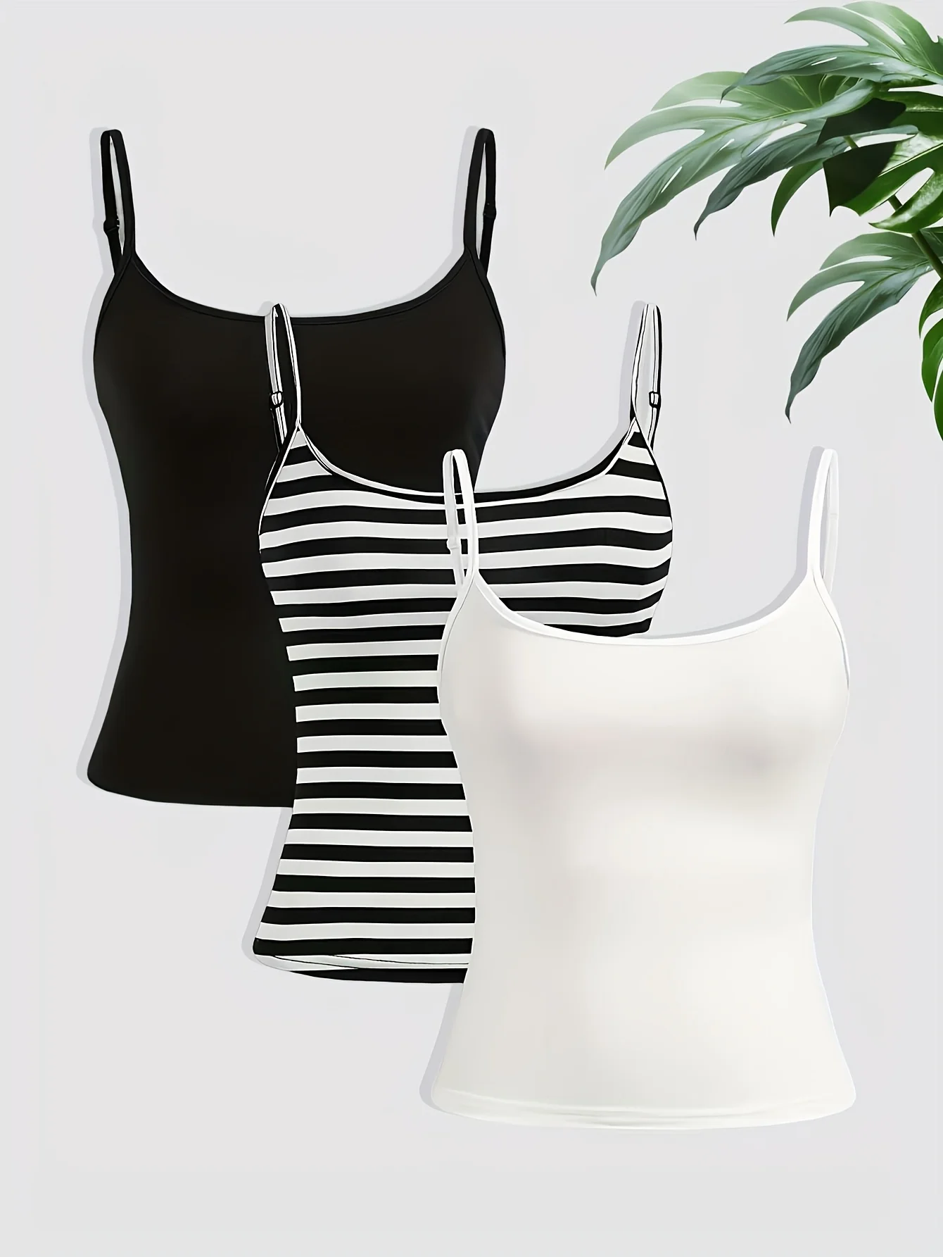 Комплект из трех предметов однотонных повседневных топов с бретельками на весну, лето и осень в Европе и Америке.
Комплект из трех предметов однотонных повседневных топов с бретельками на весну, лето и осень в Европе и Америке.