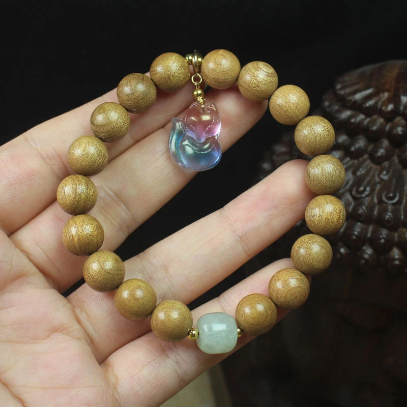10mm old golden nanmu wood bracelet with fox pendant, unisex cultural and artistic hand accessory, prayer beads
10mm old golden nanmu wood bracelet with fox pendant, unisex cultural and artistic hand accessory, prayer beads