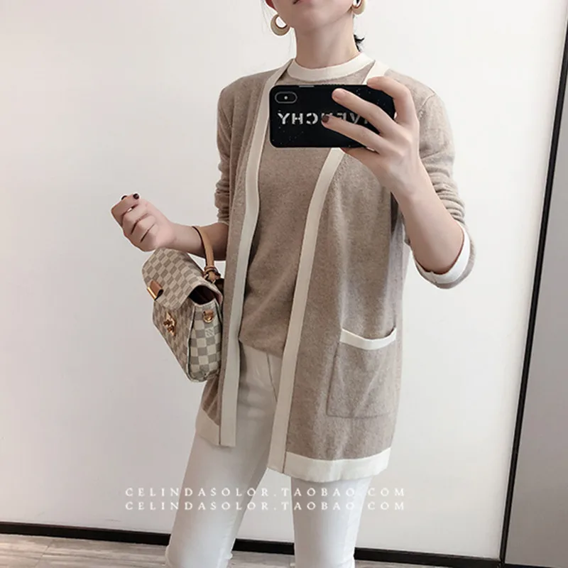 Women's two-piece sweater spring new 100% wool V-neck knitted cardigan loose fashion jacket short sleeved two-piece top
Women's two-piece sweater spring new 100% wool V-neck knitted cardigan loose fashion jacket short sleeved two-piece top