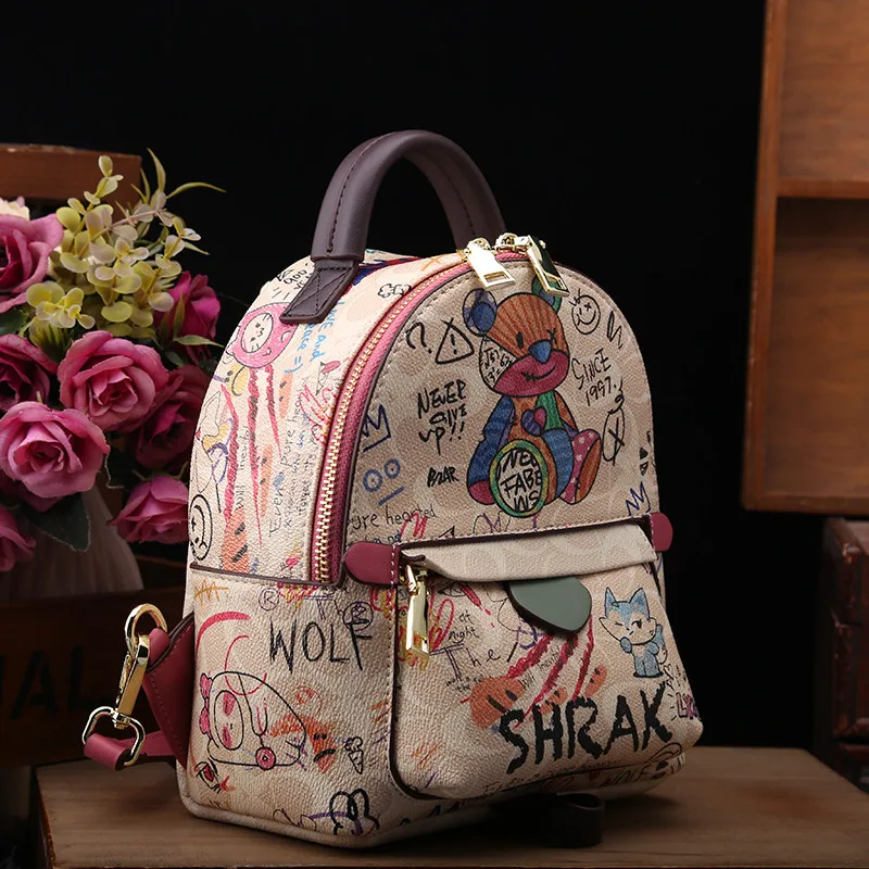 Popular and Luxury School Backpacks with Delicate Cartoon Graffiti and High Quality Leather 2026 Women New Fashion Shoulder Bag
Popular and Luxury School Backpacks with Delicate Cartoon Graffiti and High Quality Leather 2026 Women New Fashion Shoulder Bag