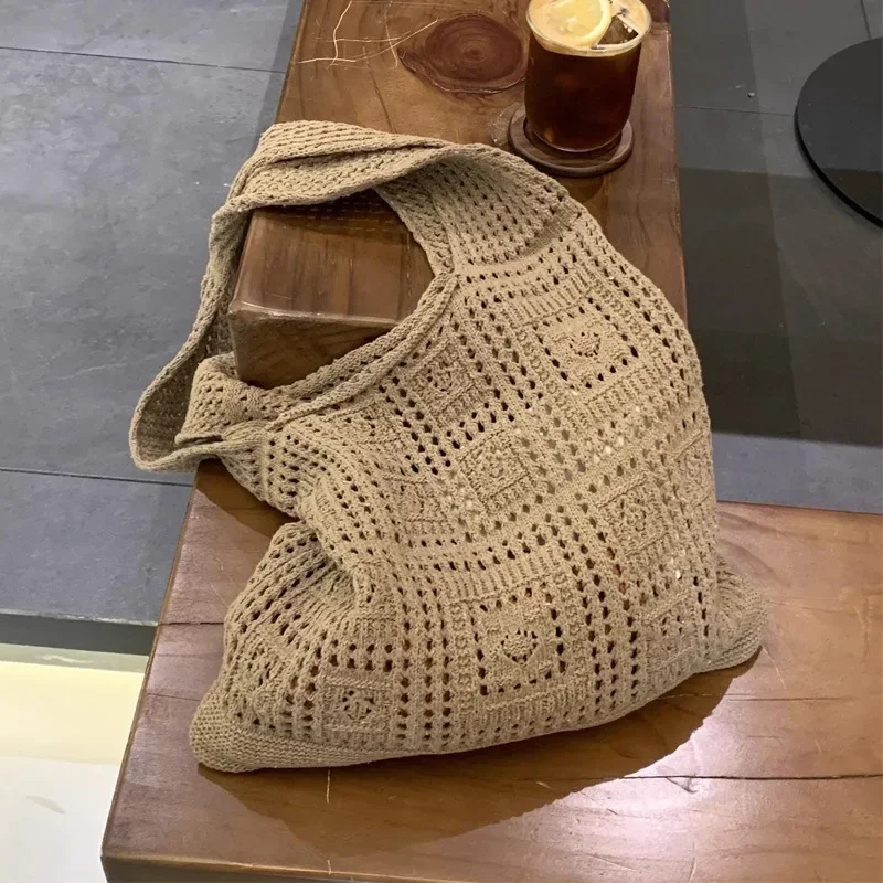 Knitted Shoulder Bag for Women's Leisure Commuting Hollowed Out Large Capacity Woven Handbag
Knitted Shoulder Bag for Women's Leisure Commuting Hollowed Out Large Capacity Woven Handbag