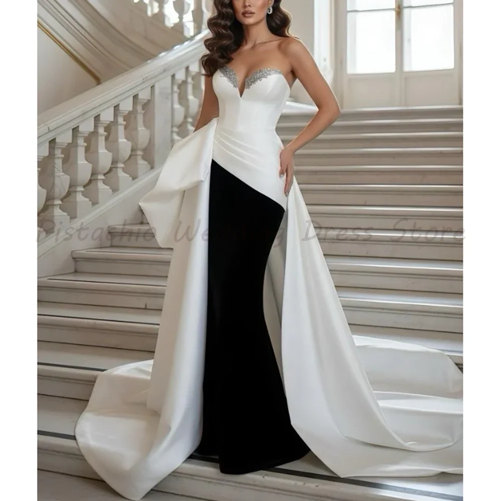 Strapless Sweetheart Beaded Mermaid Wedding Dress Black White Color Block Satin Oversized Bow Chapel Train Luxury Bridal Gown
Strapless Sweetheart Beaded Mermaid Wedding Dress Black White Color Block Satin Oversized Bow Chapel Train Luxury Bridal Gown