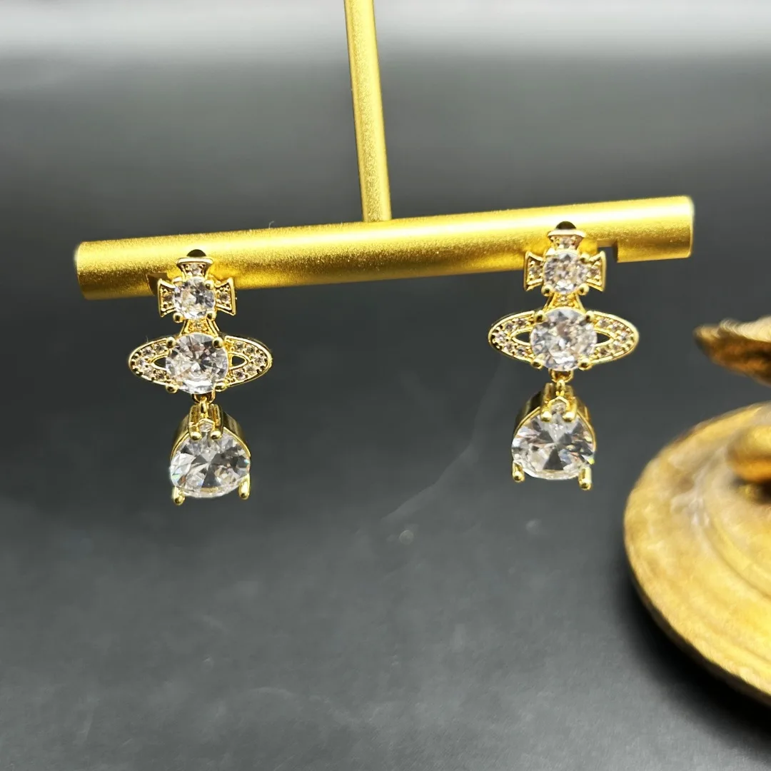 Copper plated real gold Europe and the United States light luxury temperament West after the small universe studs earrings simpl
Copper plated real gold Europe and the United States light luxury temperament West after the small universe studs earrings simpl