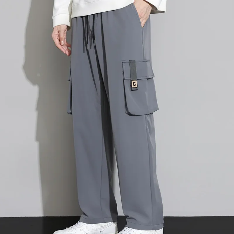 2023 Autumn and Winter New Fashion Versatile Commuter Men's Clothing Trend Drawstring Splicing Pockets Solid Color Casual Pants
2023 Autumn and Winter New Fashion Versatile Commuter Men's Clothing Trend Drawstring Splicing Pockets Solid Color Casual Pants