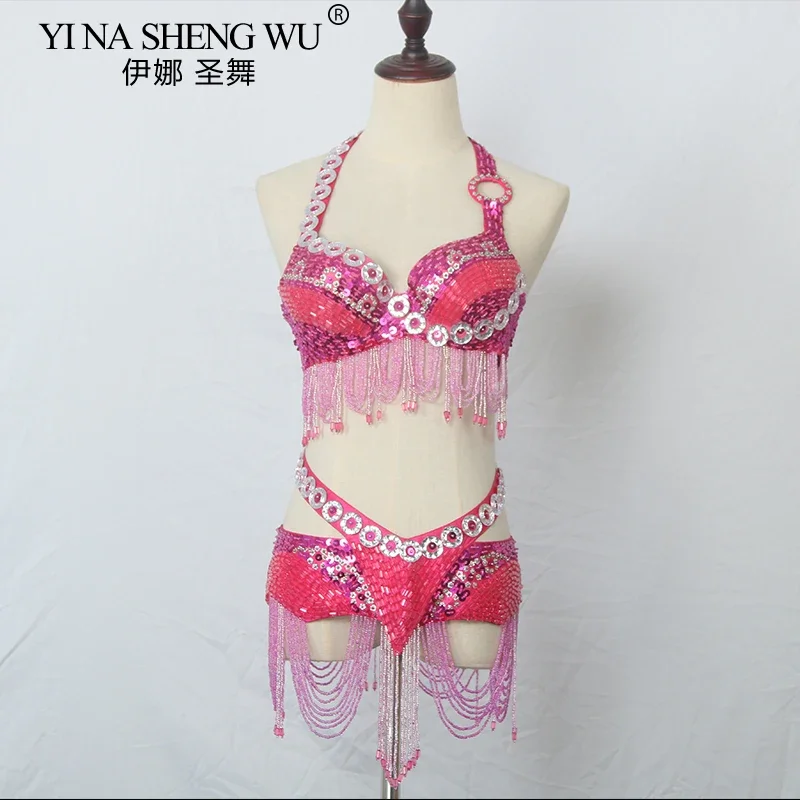 Новые профессиональные наряды для танцовщицы живота с ручным бисером, сексуальная одежда для выступлений, бюстгальтер + пояс, фиолетовые, белые костюмы для самбы, египетские наряды
Новые профессиональные наряды для танцовщицы живота с ручным бисером, сексуальная одежда для выступлений, бюстгальтер + пояс, фиолетовые, белые костюмы для самбы, египетские наряды