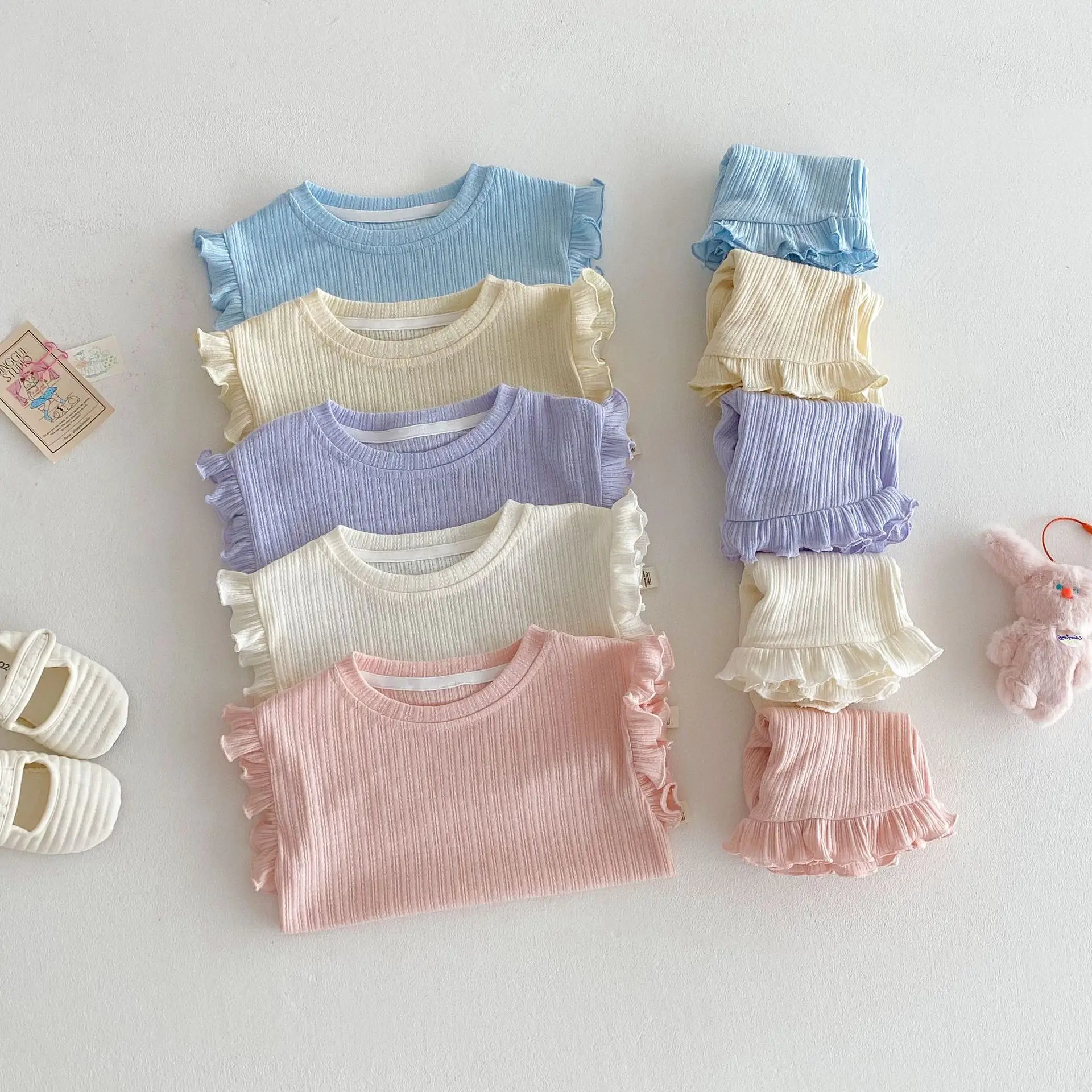 Baby Solid Color Set 2025 New Summer Girls' Ear Ear Edge Tank Top Baby Western Korean Edition Shorts Two Piece Set
Baby Solid Color Set 2025 New Summer Girls' Ear Ear Edge Tank Top Baby Western Korean Edition Shorts Two Piece Set